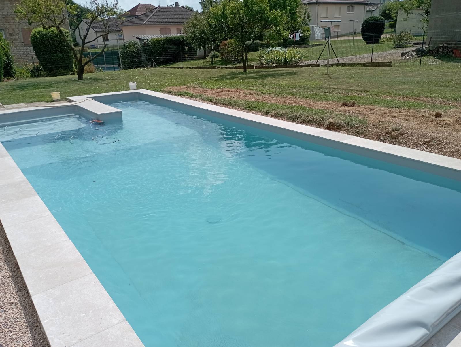 Réalisation d'une piscine forme libre de 8 m 4 m située à Replonges