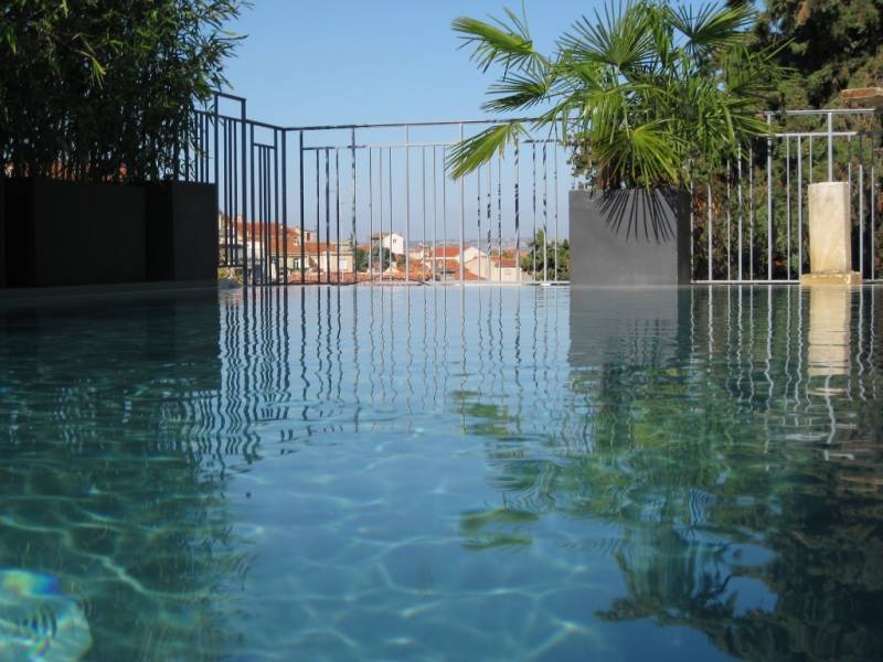 Réalisation d'une piscine rectangulaire de 10 m x 4 m située à Simandre-sur-Suran