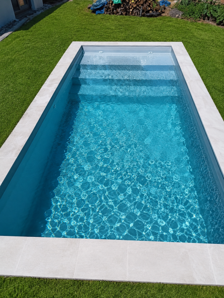 Création d'une piscine rectangulaire de 6.m x 3 m situé à Feillens
