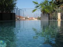 Réalisation d'une piscine rectangulaire de 10 m x 4 m située à Simandre-sur-Suran