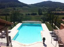 Réalisation piscine forme libre de 12 m x 8 m située à Meillonnas